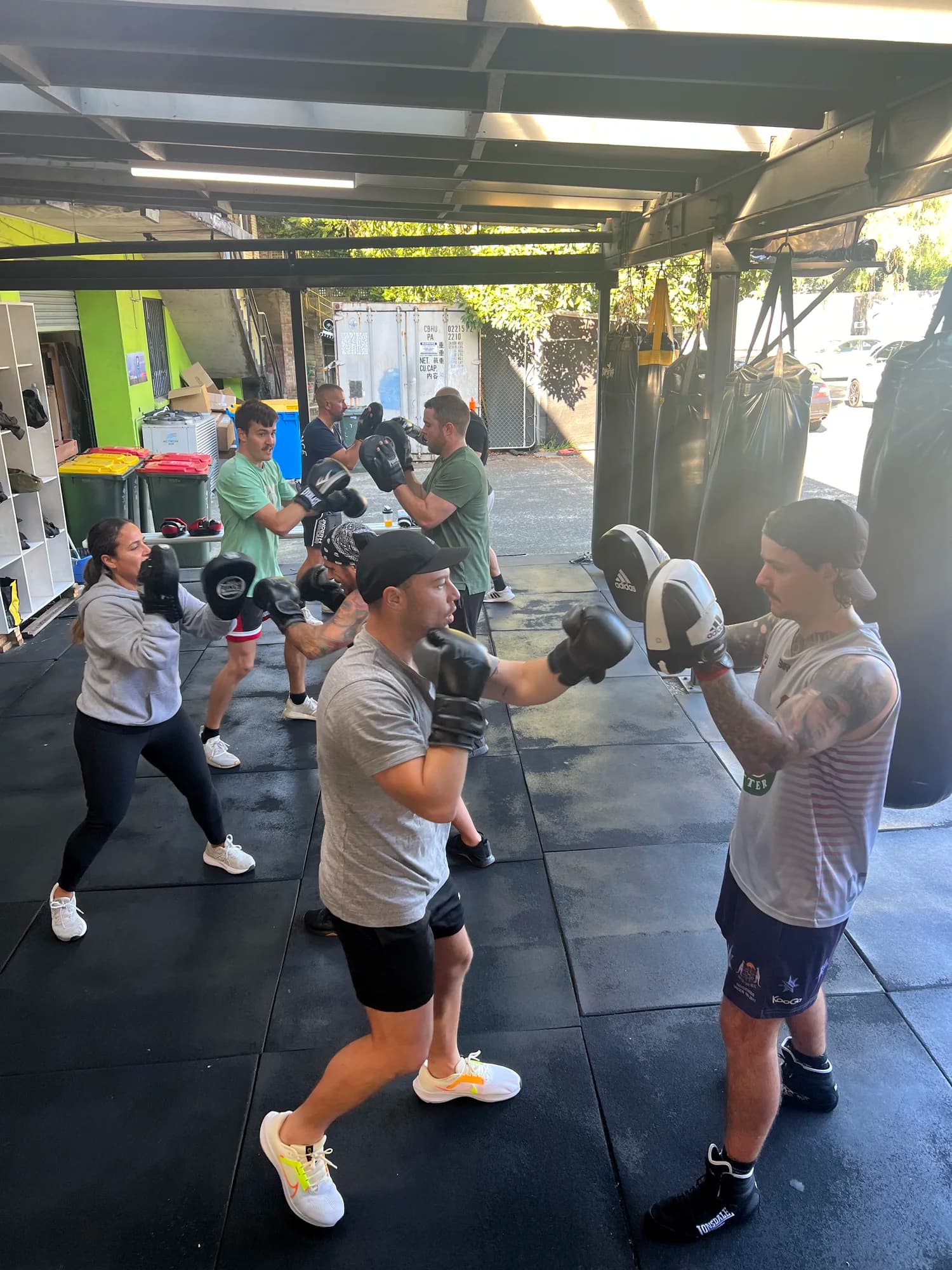 Legends Gym members training together in a coached boxing class